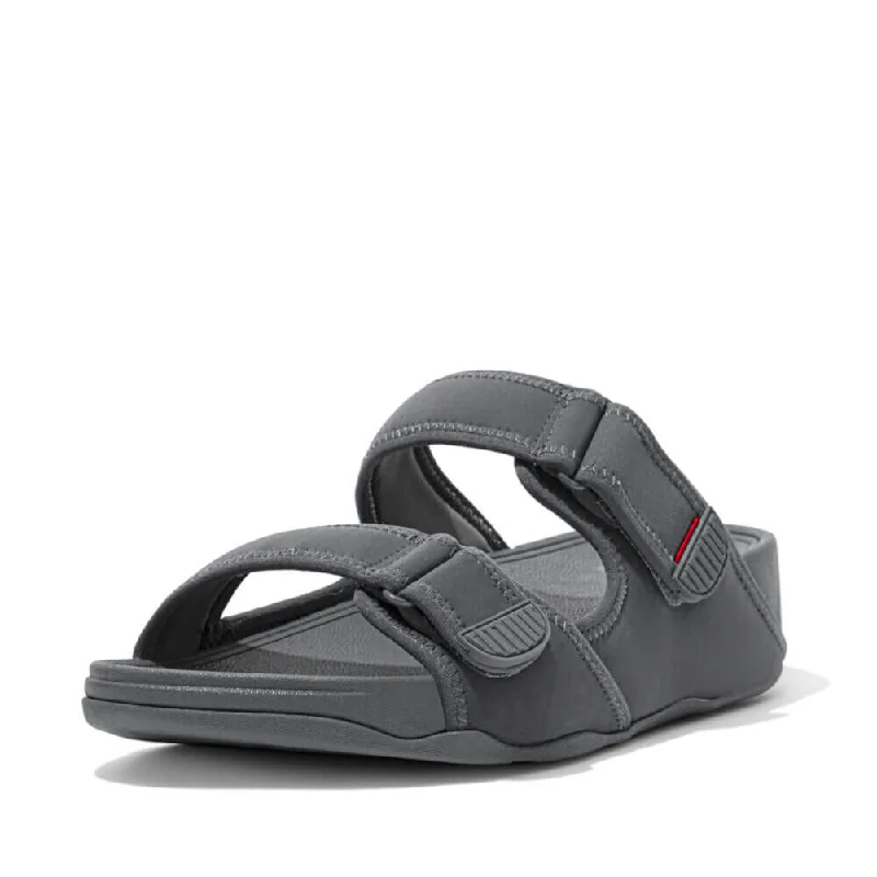 Men's sandals with a durable outer soleFitFlop Men's Gogh Moc Slide Sandals - Pewter Grey Men's sandals with a durable outer soleFitFlop Men's Gogh Moc Slide Sandals - Pewter Grey