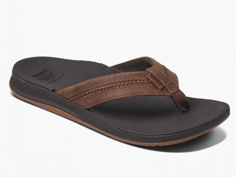 Men's sandals with a perforated leather upper for ventilationReef Leather Ortho Coast - Men's Sandal Men's sandals with a perforated leather upper for ventilationReef Leather Ortho Coast - Men's Sandal