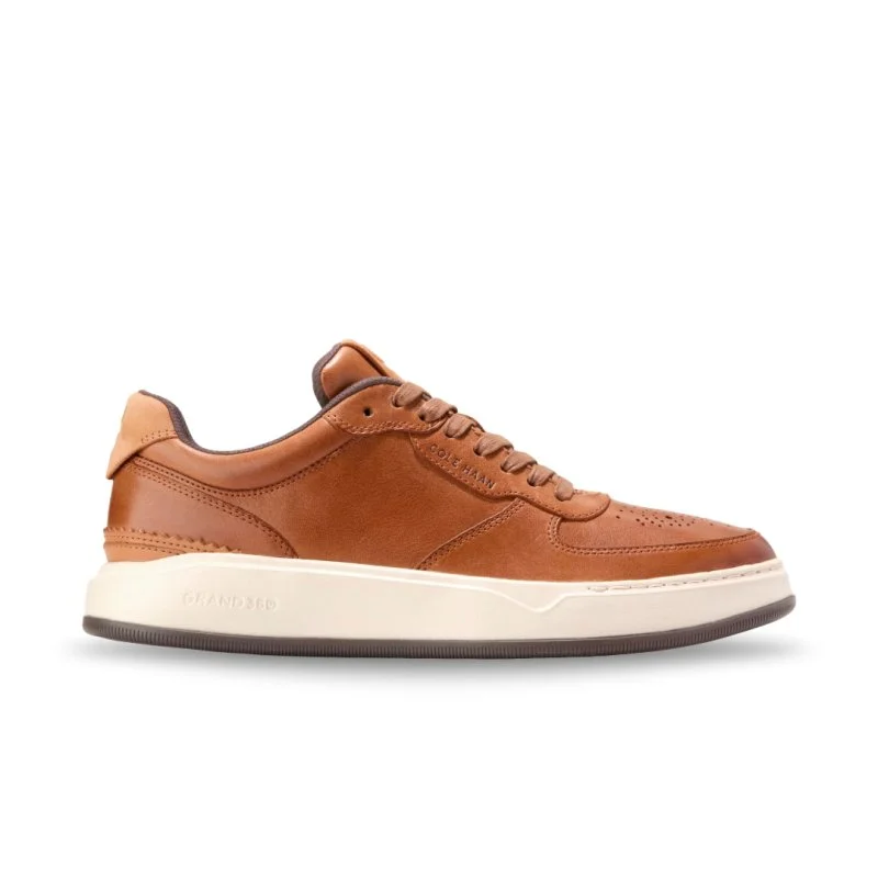 Men's Oxford shoes with a wingtip design and leather soleCole Haan Men's GrandPro Crossover - Acorn/Ivory Men's Oxford shoes with a wingtip design and leather soleCole Haan Men's GrandPro Crossover - Acorn/Ivory