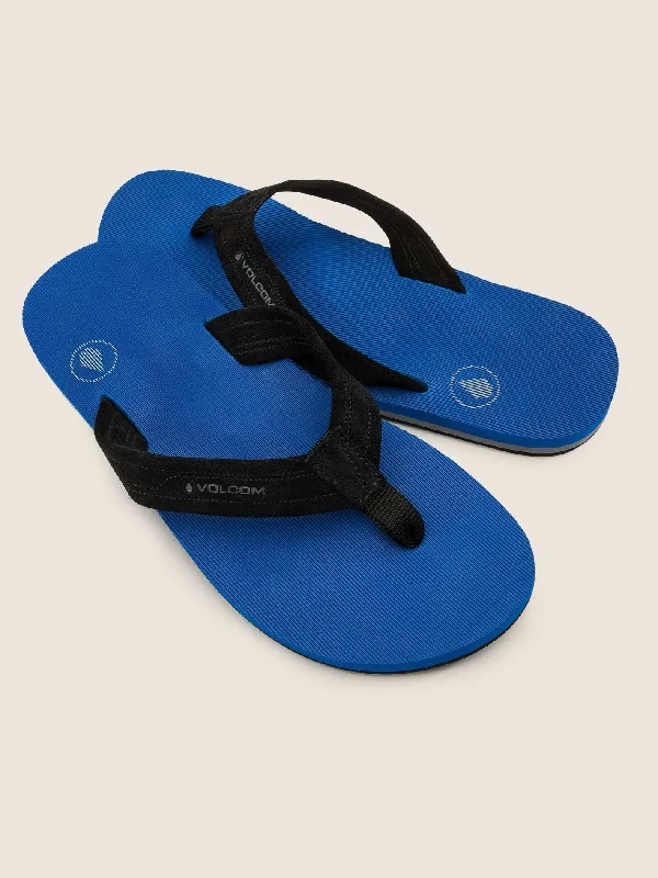 Men's sandals in a neutral color like black or brownVolcom Driftin Leather Mens Sandal - True Blue Men's sandals in a neutral color like black or brownVolcom Driftin Leather Mens Sandal - True Blue