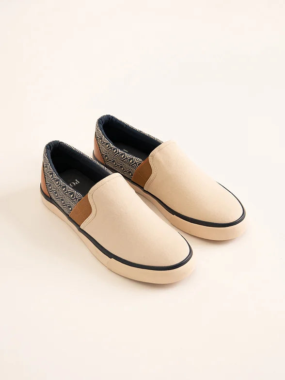 Men's leather loafers with a penny slot Men's leather loafers with a penny slot AFRICAN PRINT SLIP ON SNEAKER - STONE Men's leather loafers with a penny slot Men's leather loafers with a penny slot AFRICAN PRINT SLIP ON SNEAKER - STONE
