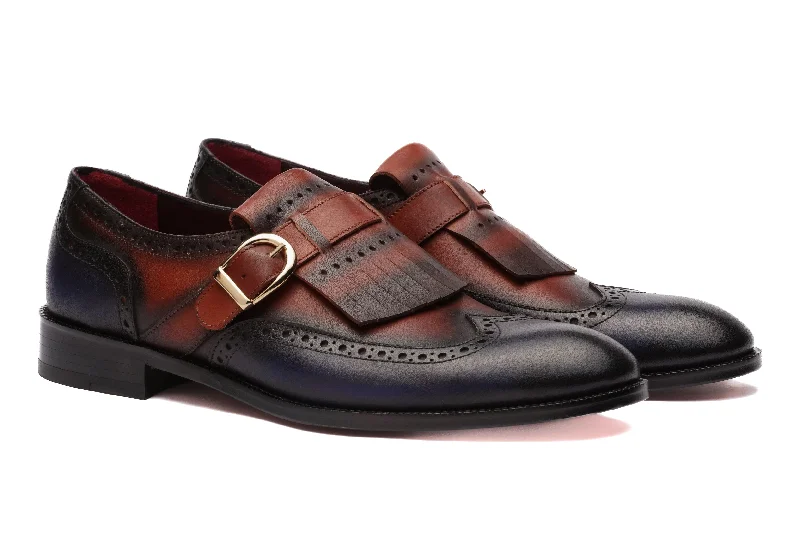 Men's leather loafers with a penny slot Men's leather loafers with a penny slot The Fringed Brogue - Cognac & Dark Blue Men's leather loafers with a penny slot Men's leather loafers with a penny slot The Fringed Brogue - Cognac & Dark Blue